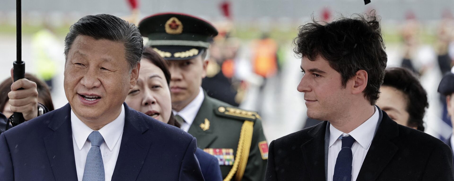 France's Prime Minister Gabriel Attal (R) greets China's President Xi Jinping upon his arrival for an official two-day state visit, at Orly airport, south of Paris on May 5, 2024 - Sputnik International, 1920, 06.05.2024