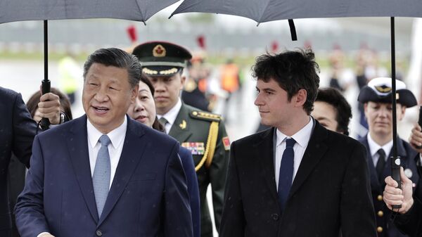 Chinese President Xi Jinping is welcomed by French Prime Minister Gabriel Attal at Orly airport, south of Paris, Sunday, May 5, 2024. - Sputnik International