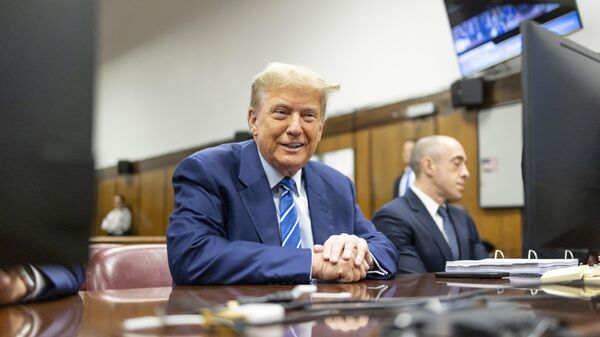 Former President Donald Trump awaits the start of proceedings on the second day of jury selection at Manhattan criminal court, Tuesday, April 16, 2024, in New York - Sputnik International