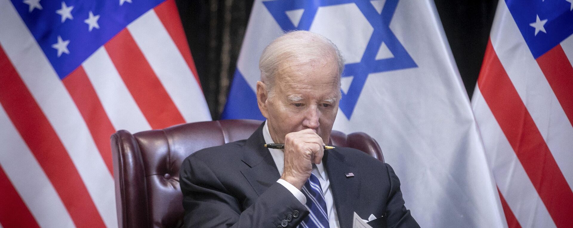 US President Joe Biden pauses during a meeting with Israeli Prime Minister Benjamin Netanyahu to discuss the war between Israel and Hamas, in Tel Aviv, Israel, Oct. 18, 2023 - Sputnik International, 1920, 08.05.2024