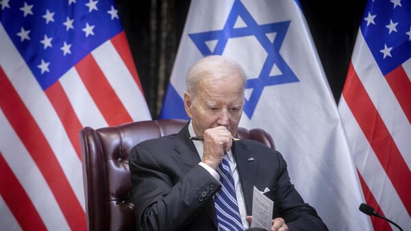 US President Joe Biden pauses during a meeting with Israeli Prime Minister Benjamin Netanyahu to discuss the war between Israel and Hamas, in Tel Aviv, Israel, Oct. 18, 2023 - Sputnik International