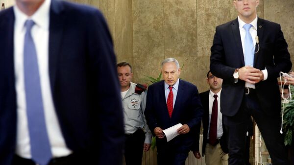 Israeli Prime Minister Benjamin Netanyahu arrives to chair the weekly cabinet meeting in Jerusalem, Sunday, April 10, 2016 - Sputnik International