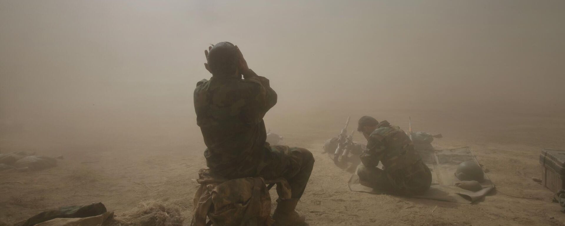 Afghan National Army soldiers protect their faces from flying dust as a helicopter takes off from a U.S. army base in the Pech Valley of Afghanistan's Kunar province Sunday, Nov. 1, 2009 - Sputnik International, 1920, 09.05.2024