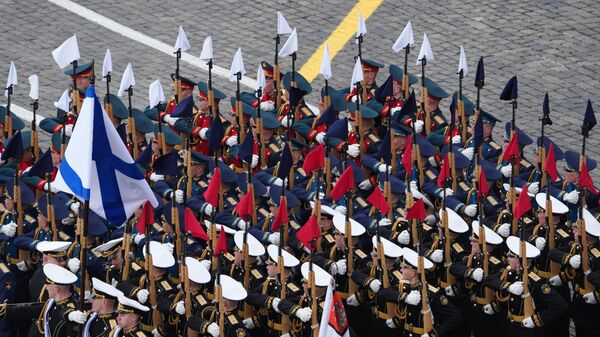 Russian servicemen march in columns before a military parade on Victory Day, which marks the 79th anniversary of the victory over Nazi Germany in World War Two, in Red Square in Moscow, Russia. - Sputnik International