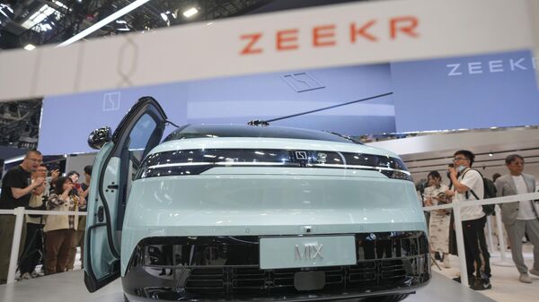 Visitors look at a Zeekr Mix car during the China Auto Show in Beijing, China, Friday, April 26, 2024.  - Sputnik International