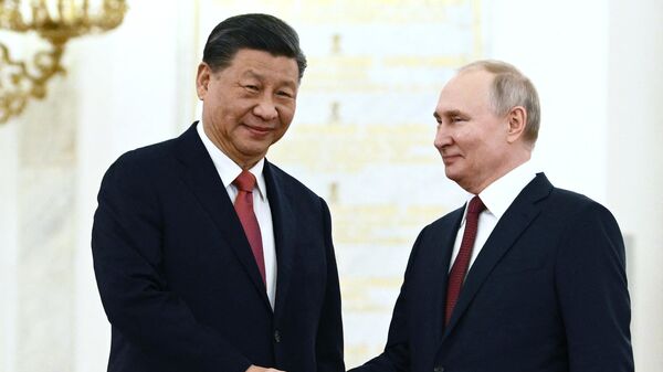 Russian President Vladimir Putin meets with China's President Xi Jinping at the Kremlin in Moscow on March 21, 2023 - Sputnik International
