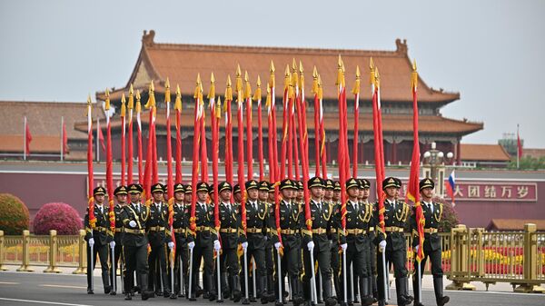 Guard of honor before the ceremony of the official meeting between Russian President Vladimir Putin and Chinese President Xi Jinping in front of the Great Hall of the People on Tiananmen Square in Beijing. - Sputnik International