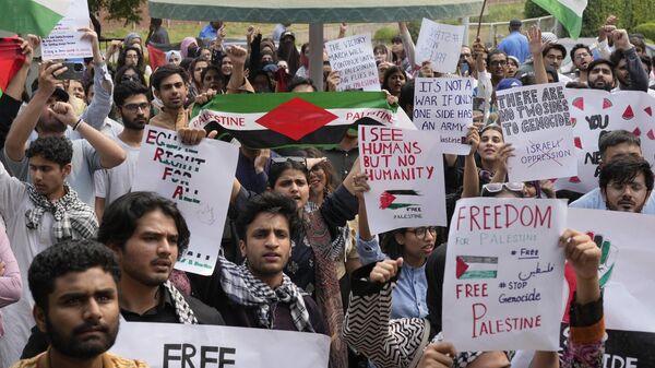 University students take part in rally against the Israeli airstrikes on Gaza and to show solidarity with Palestinian people, in Lahore, Pakistan, Friday, May 10, 2024 - Sputnik International