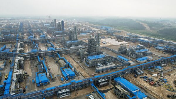 Bird's eye view of the Amur Gas Processing Plant, servicing the Power of Siberia pipeline. At full capacity, the plant can produce up to 38 million cubic meters of purified methane fraction, 2.4 million tons of ethane, 1.5 million tons of liquefied hydrocarbon gases, 200,000 tons of pentane-hexane fraction, as well as 60 million cubic meters of helium - a crucial resource for high-tech industries. - Sputnik International