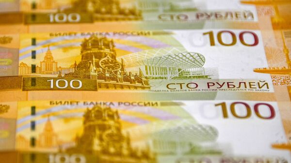 Russia's 100-ruble banknotes. File photo - Sputnik International