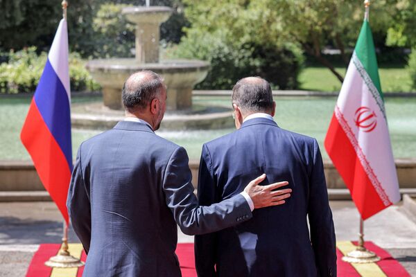 Iran&#x27;s Foreign Minister Hossein Amir-Abdollahian (left) receives his Russian counterpart Sergey Lavrov (right) at the Foreign Ministry headquarters in Iran&#x27;s capital Tehran, June 23, 2022. The diplomats held discussions on Russian-Iranian nuclear cooperation, withstanding Western sanctions, as well as global and regional issued pertaining to the countries&#x27; ties. - Sputnik International