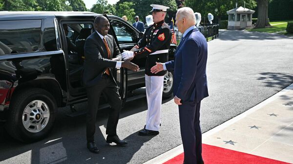 US President Joe Biden greets Kenya’s President William Ruto upon his arrival at the South Portico of the White House in Washington, DC on May 22, 2024. - Sputnik International