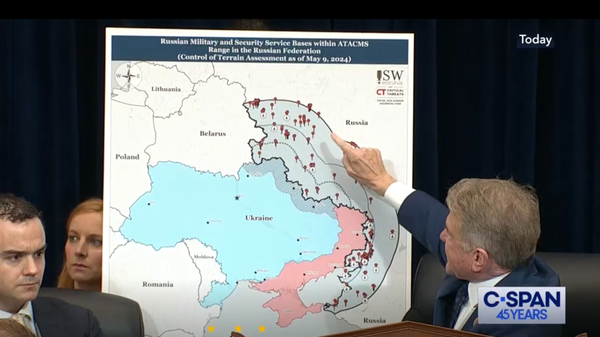 Texas Republican Congressman Michael McCaul gestures toward Russian cities and infrastructure on a map showing the range of US long-range missile systems which have been delivered to Ukraine, but which the Biden administration has not formally allowed Kiev to use against targets deep inside Russia, during Secretary of State Antony Blinken's testimony before the House Committee on Appropriations, May 22, 2024. - Sputnik International
