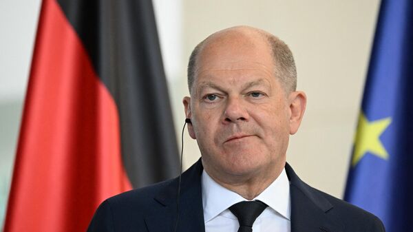 German Chancellor Olaf Scholz looks on during a joint press conference with the Portuguese Prime Minister at the Chancellery in Berlin, Germany on May 24, 2024 - Sputnik International