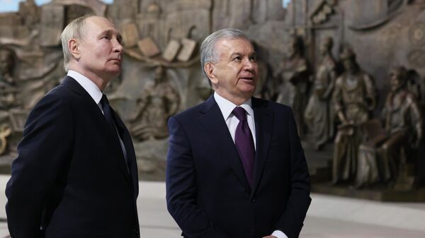 Russian President Vladimir Putin and Uzbek President Shavkat Mirziyoyev - Sputnik International
