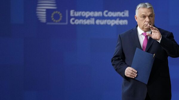 Hungary's Prime Minister Viktor Orban arrives for an EU summit at the European Council building in Brussels, Thursday, Dec. 14, 2023. - Sputnik International