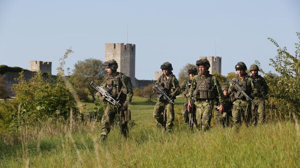 This picture shows Swedish military patrolling outside Visby, on Gotland island, Sweden. File photo. - Sputnik International