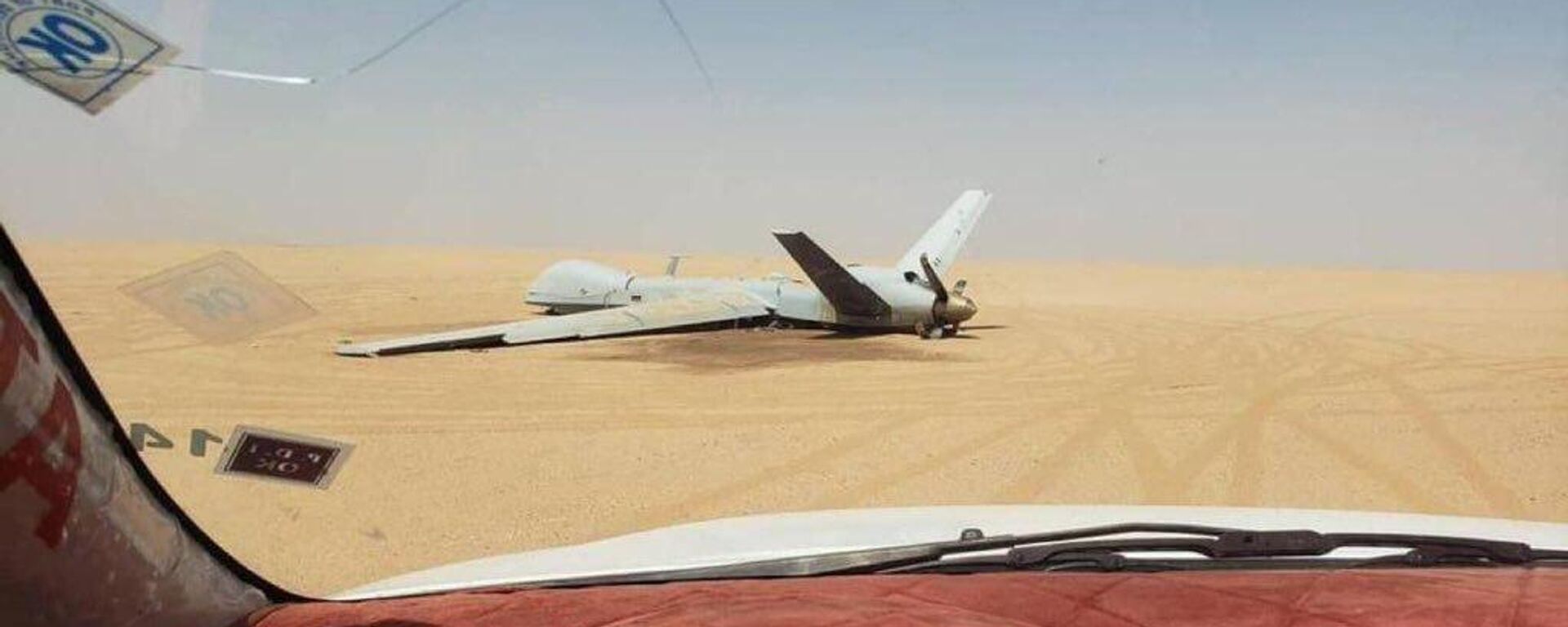 $31 million US MQ-9 Reaper drone lies in a desert in Marib, Yemen after being shot down by Houthi air defenses. - Sputnik International, 1920, 31.05.2024