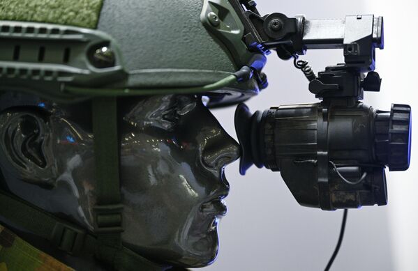 Military helmet-mounted night vision device at the XV International Integrated Security Exhibition. - Sputnik International