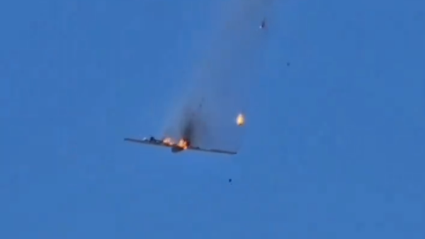 An Israeli Hermes drone falls from the skies after being struck by a Hezbollah surface-to-air missile over southern Lebanon. Screenshot of social media video. - Sputnik International