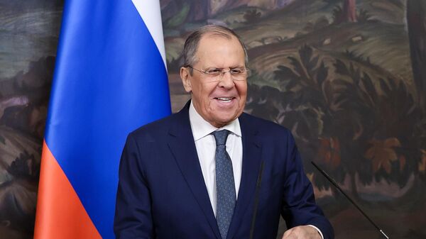 In this handout photo released by the Russian Foreign Ministry, Russian Foreign Minister Sergey Lavrov makes a joint statement with Ambassador of Cameroon to Russia Mahamat Paba Sale during a meeting with heads of diplomatic missions of African countries to mark Africa Day in Moscow, Russia - Sputnik International