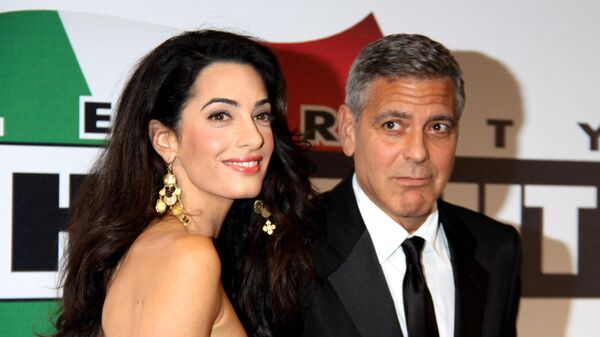 US actor George Clooney and his wife Amal  - Sputnik International