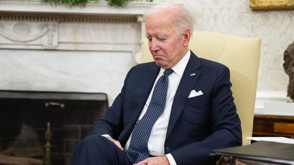 US President Joe Biden listens during a meeting  Israeli President Isaac Herzog in the Oval Office of the White House in Washington, DC, October 26, 2022. - Sputnik International