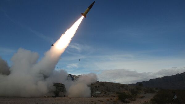 In this image provided by the U.S. Army, soldiers, from the 3rd Battalion, 321st Field Artillery Regiment of the 18th Field Artillery Brigade out of Fort Bragg N.C., conduct live fire testing at White Sands Missile Range, N.M., on Dec. 14, 2021, of early versions of the Army Tactical Missile System.  - Sputnik International