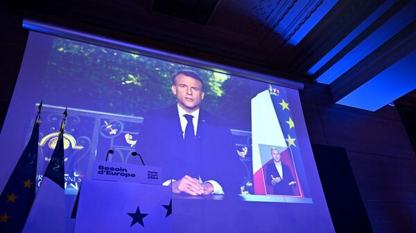 A screen broadcast an address to the nation by France's President Emmanuel Macron during which he announced he is dissolving the National Assembly. - Sputnik International