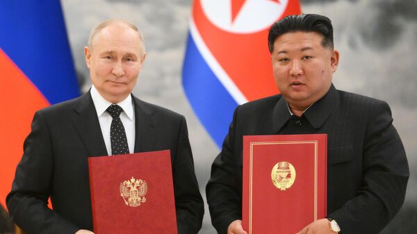 Russian President Vladimir Putin and North Korean leader Kim Jong Un sign a Comprehensive Strategic Partnership Agreement. June 19, 2024. - Sputnik International