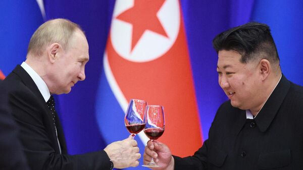 Russian President Vladimir Putin and North Korean leader Kim Jong Un  - Sputnik International