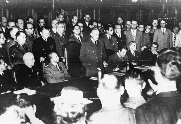 While members of the German and foreign press crowd around as Foreign Minister Joachim Von Ribbentrop declares Germany at war with Russia on June 22, 1941, at the Foreign Office in Berlin. At Ribbentrop’s right is Dr. Otto Dietrich, secretary of state in charge of press relations, and at his left Dr. Paul Schmidt, interpreter. - Sputnik International