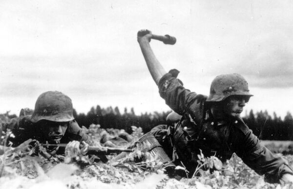 As the Nazi battalions pushed deep into the European part of the USSR, Soviet forces fought desperately to slow and then halt the enemy advance.Above: Nazi German soldiers are seen in action against the Red Army at an unknown location along the frontlines in the early days of the German invasion of the Soviet Union, in this 1941 file photo. - Sputnik International