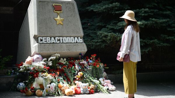 Makeshift memorial to victims of a Ukrainian missile attack on Sevastopol, Republic of Crimea, Russia - Sputnik International