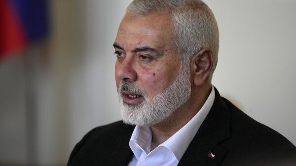 Hamas chief Ismail Haniyeh speaks during his meeting with Iranian Foreign Minister Hossein Amirabdollahian in Tehran, Iran, Tuesday, March 26, 2024. - Sputnik International