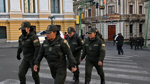 Riot police members take position in Plaza Murillo following an attempt on the eve by a military movement to seize the palace by force, in La Paz, on June 27, 2024. - Sputnik International