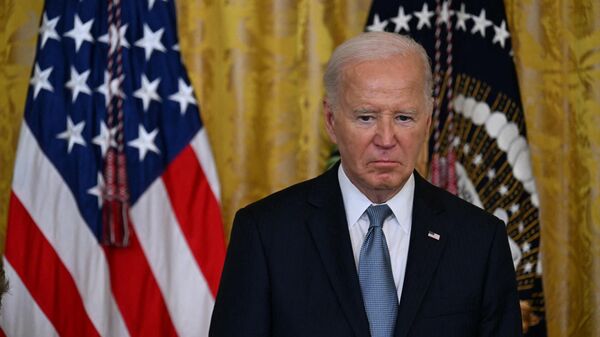 US President Joe Biden looks on during a Medal of Honor ceremony in the East Room of the White House in Washington, DC, on July 3, 2024.  - Sputnik International
