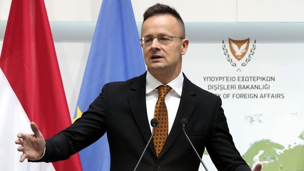 Hungarian foreign minister Peter Szijjarto talks to the media during a press conference in Nicosia, Cyprus, on April 2, 2024 - Sputnik International