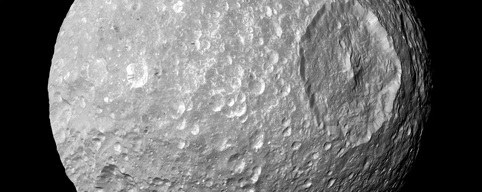 This Feb. 13, 2010 image provided by NASA shows Saturn's moon Mimas and it's large Herschel Crater, captured by the Cassini spacecraft. This Feb. 13, 2010 image provided by NASA shows Saturn's moon Mimas and it's large Herschel Crater, captured by the Cassini spacecraft. - Sputnik International, 1920, 17.07.2024
