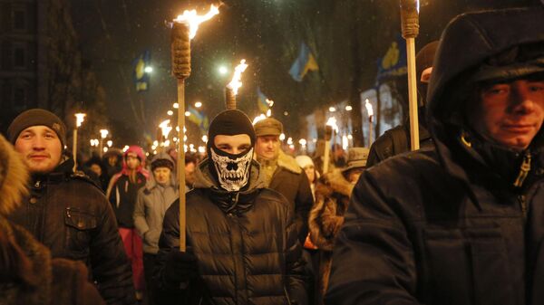 Ukrainian Neo-Nazis carry burning torches during a rally in downtown Kiev, Ukraine, Friday, Jan. 1, 2016, to commemorate the 1909 birth anniversary of notorious Ukrainian political activist and national independence leader Stepan Bandera - Sputnik International