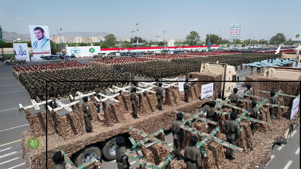 Khatif-1 (left) and Khatif-2 (right) drones on parade in Sanaa, Yemen in 2022. Screenshot of Houthi Media Office video. - Sputnik International
