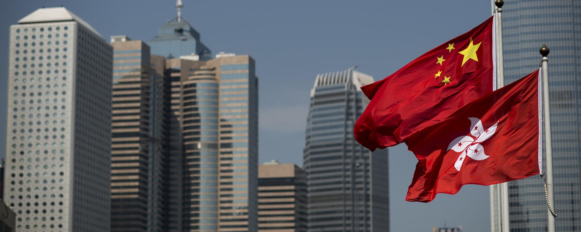 State flags of China and Hong Kong at the governmental buildings area - Sputnik International, 1920, 22.07.2024