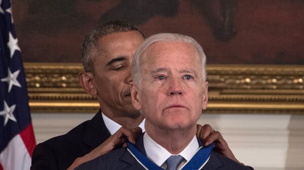 US President Barack Obama awards Vice President Joe Biden the Presidential Medal of Freedom during a tribute to Biden at the White House in Washington, DC, on January 12, 2017.  - Sputnik International