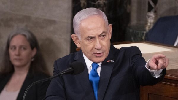 Israeli Prime Minister Benjamin Netanyahu acknowledges Israeli soldiers while addressing a joint meeting of Congress at the US Capitol on July 24, 2024 in Washington, DC. - Sputnik International