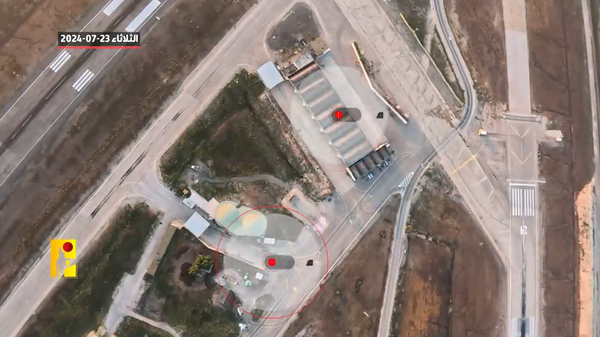 Screenshot of footage shot by Hezbollah drone loitering unmolested over a secret Israeli airbase in northern Israel. Video released by Hezbollah's media office. - Sputnik International