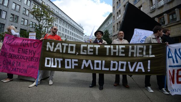 Participants of a rally protesting against the NATO summit in Warsaw - Sputnik International