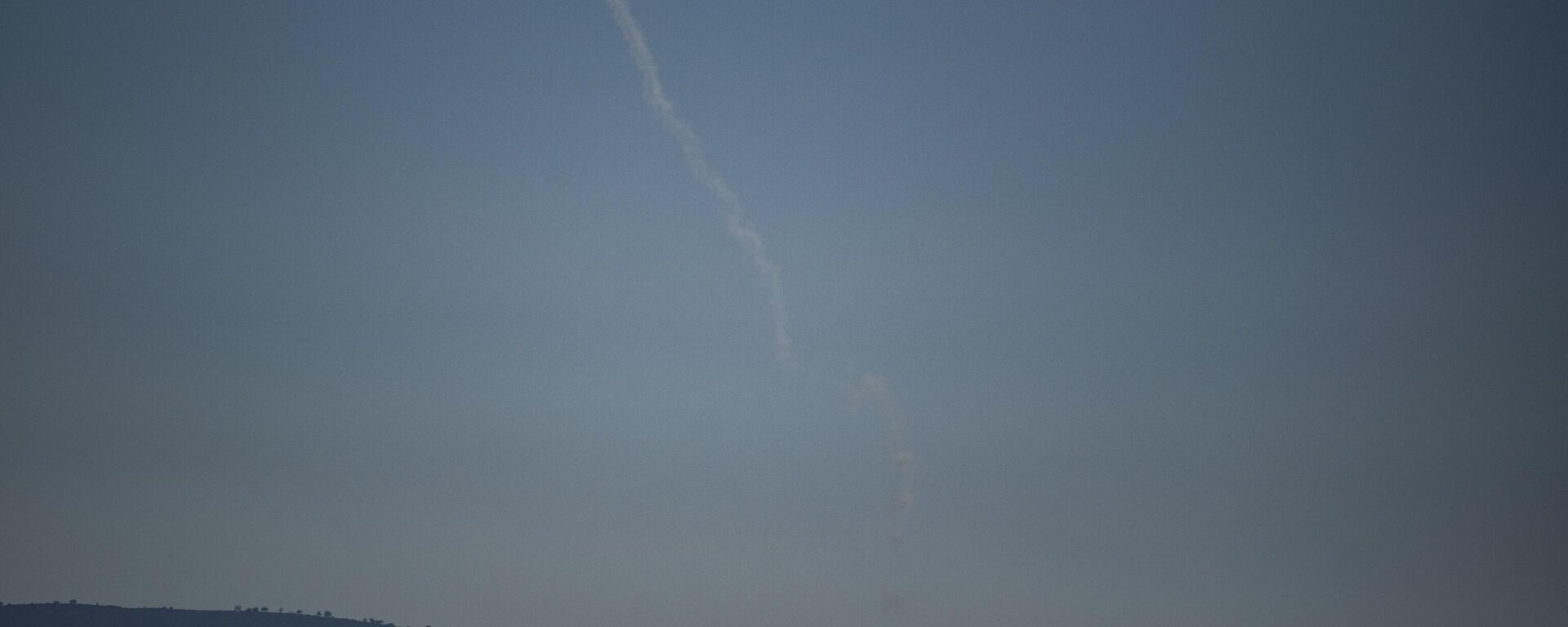 Israeli Iron Dome air defense system fires to intercept an attack from Lebanon over the Galilee region as seen from the Golan Heights, Thursday, July 18, 2024. - Sputnik International, 1920, 27.07.2024