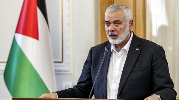 Ismail Haniyeh, the Doha-based political bureau chief of the Palestinian Islamist movement Hamas, speaks to the press after a meeting with the Iranian foreign minister in Tehran on March 26, 2024. - Sputnik International