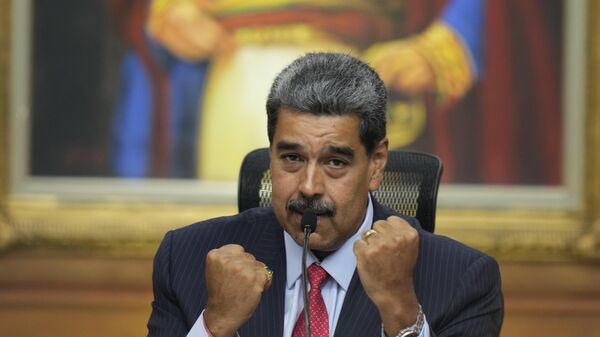 President Nicolas Maduro gestures during a news conference at Miraflores presidential palace in Caracas, Venezuela, Wednesday, July 31, 2024, three days after his disputed reelection. (AP Photo/Matias Delacroix) - Sputnik International