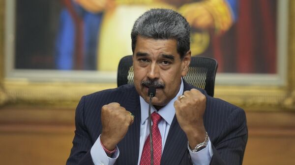 President Nicolas Maduro gestures during a news conference at Miraflores presidential palace in Caracas, Venezuela, Wednesday, July 31, 2024, three days after his disputed reelection. (AP Photo/Matias Delacroix) - Sputnik International